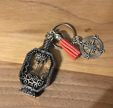 Glass bottle key chain with compass