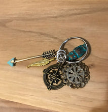 Compass key chain with charms