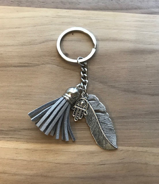 Tassel Key Chain with Charms- Gray with Feather and Illuminati Hand Charms